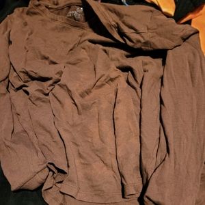 A long sleeve brown shirt